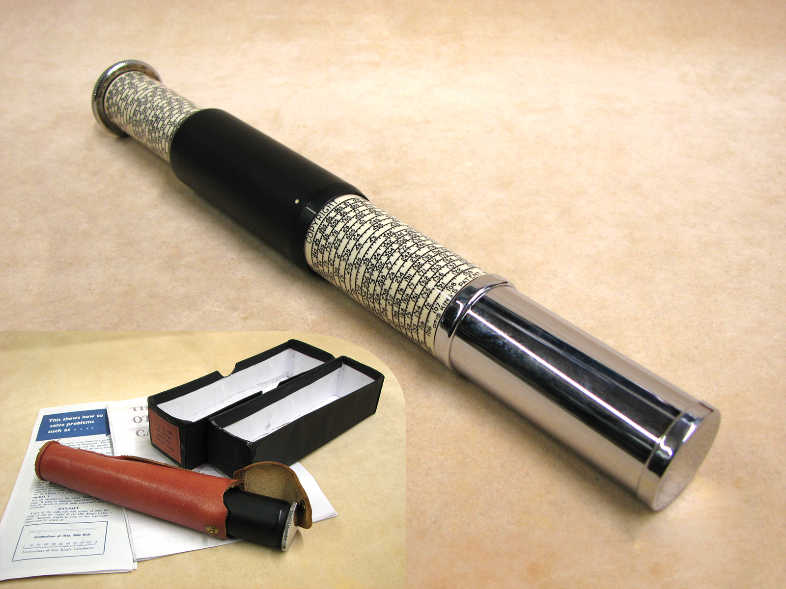 Early 1970's Otis King Model K type C leather cased cylindrical slide rule calculator